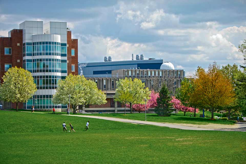 Computer Science buildings on the Brandeis campus in spring