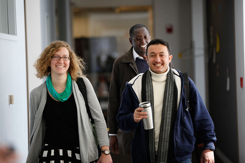 students walking down a hallway