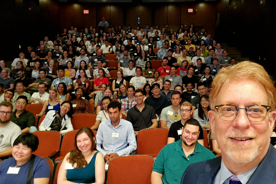 dean chasalow takes a selfie with the incoming students