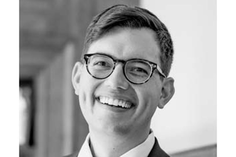 Black and white headshot of Daniel Ruggles