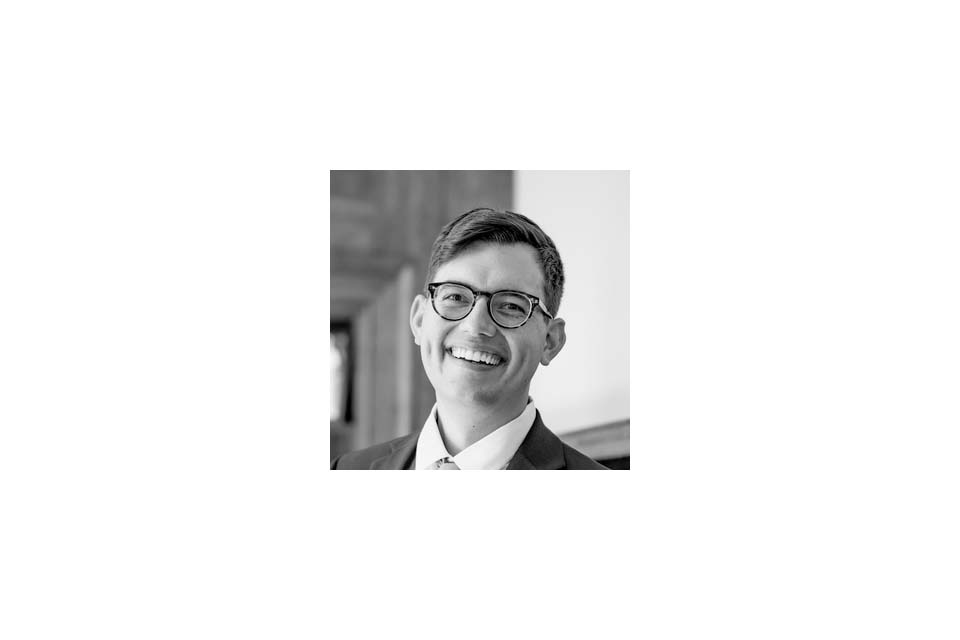 Black and white headshot of Daniel Ruggles