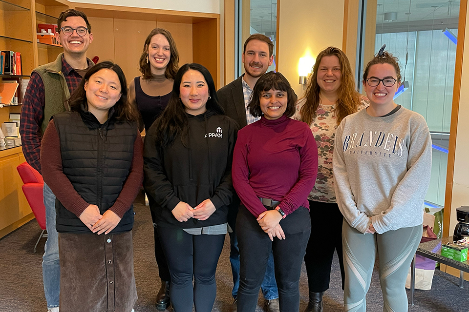 Members of the Brandeis graduate writing group pose for a photo. Back row, from left: Daniel Ruggles, Ashley Gilliam, Joe Weisberg, Marie Comuzzo. Front row, from left: Manning Zhang, Emily Thoman, Sanchita Dasgupta, Anna Valcour.