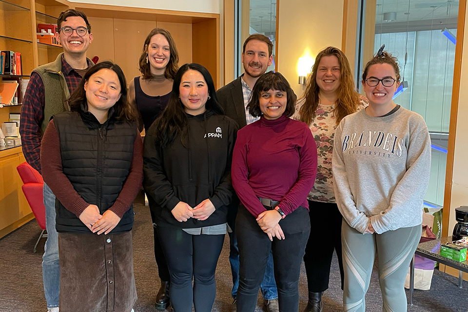 The members of the graduate writing group stand in two lines. Back row (from left): Daniel Ruggles, Ashley Gilliam, Joseph Weisberg, Marie Comuzzo. Front row, from left: Manning Zhang, Emily Thoman, Sanchita Dasgupta, Anna Valcour.