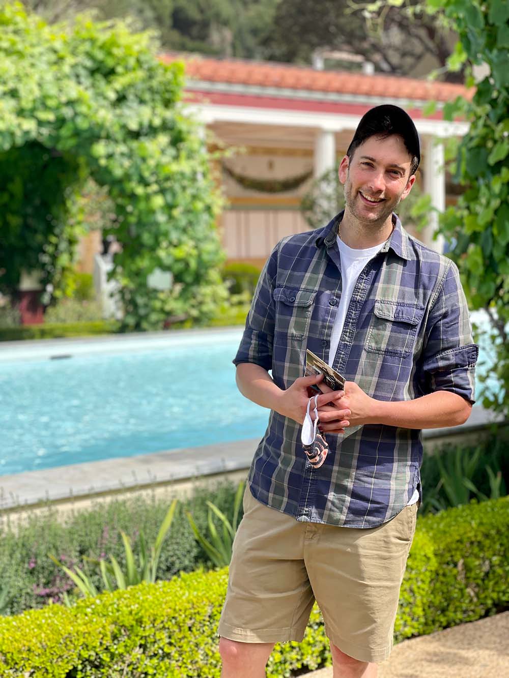 Stephen Anthony Guerriero standing in front of the Getty Villa