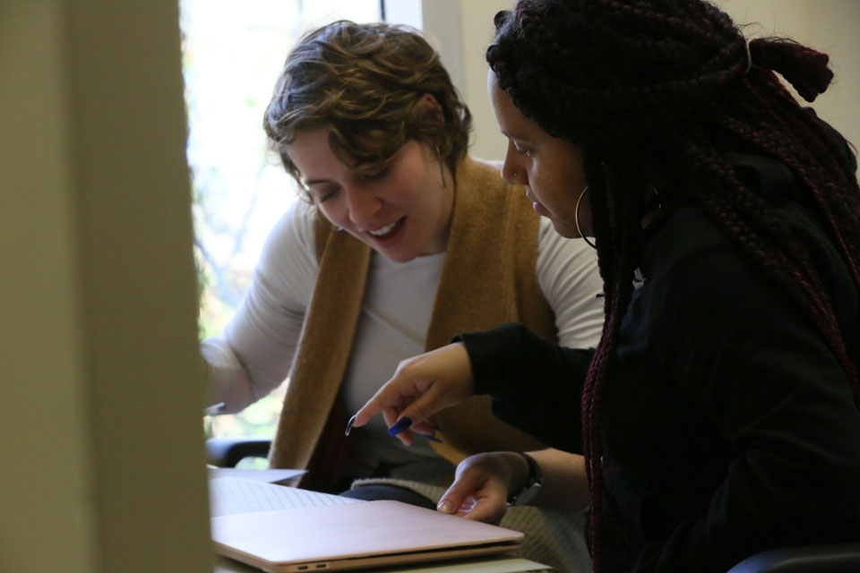 TA and student studying