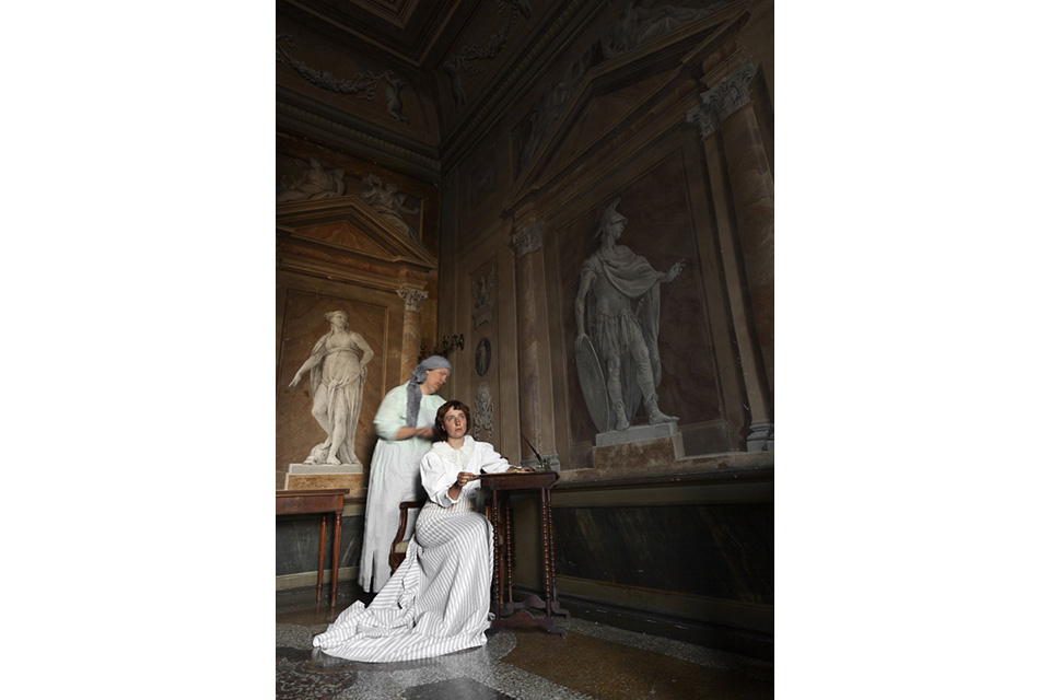 image of two women in museum, historical clothing