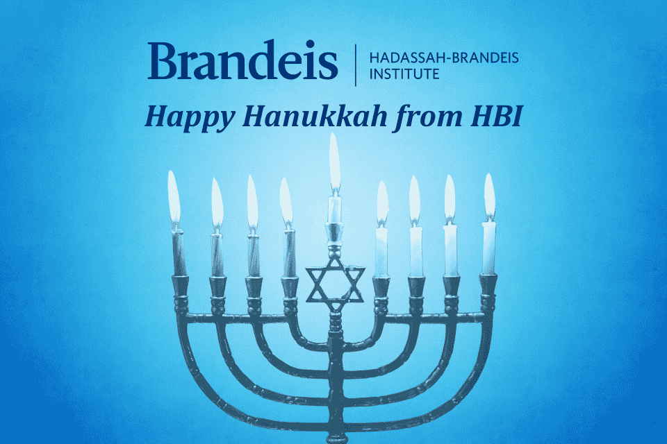 Logo text Brandeis, Hadassah-Brandeis Institute, text below: Happy Hanukkah from HBI  Image below, a menorah with a Jewish star and eight lit candles plus a taller shamash candle in the middle