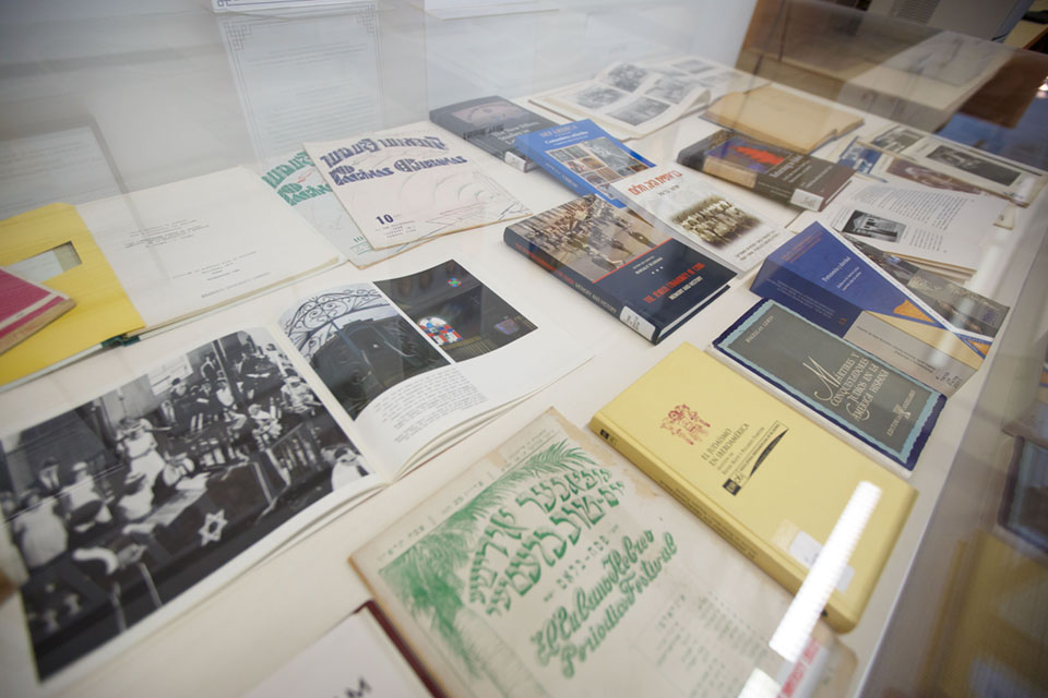 Books and other publications, part of a LAJGS archive project, on display in a case