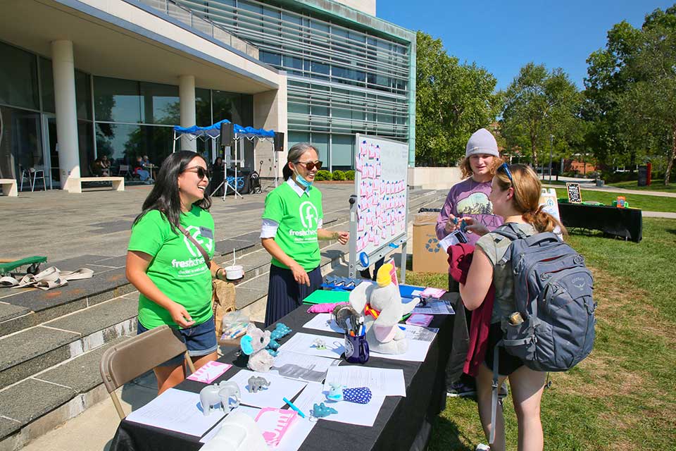 Students gather at the UBelong booth