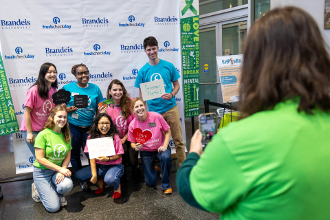 A group poses for a photo at Fresh Check Day