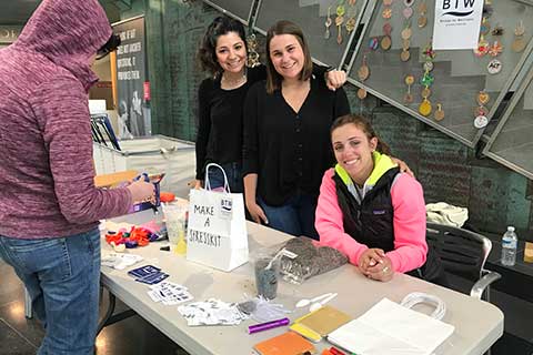 BTW Educators smile at a tabling event