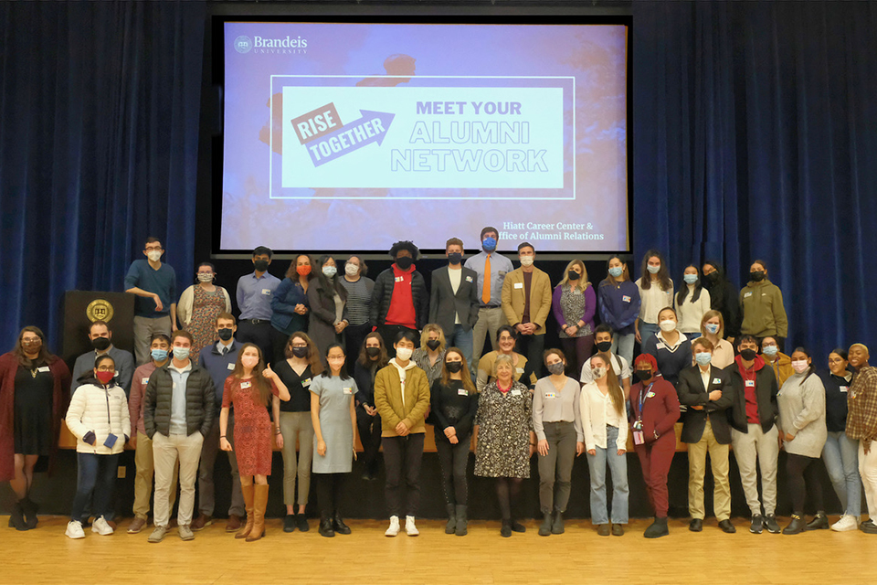 A group photo of student and alumni attendees at Deis Dinner 2021.