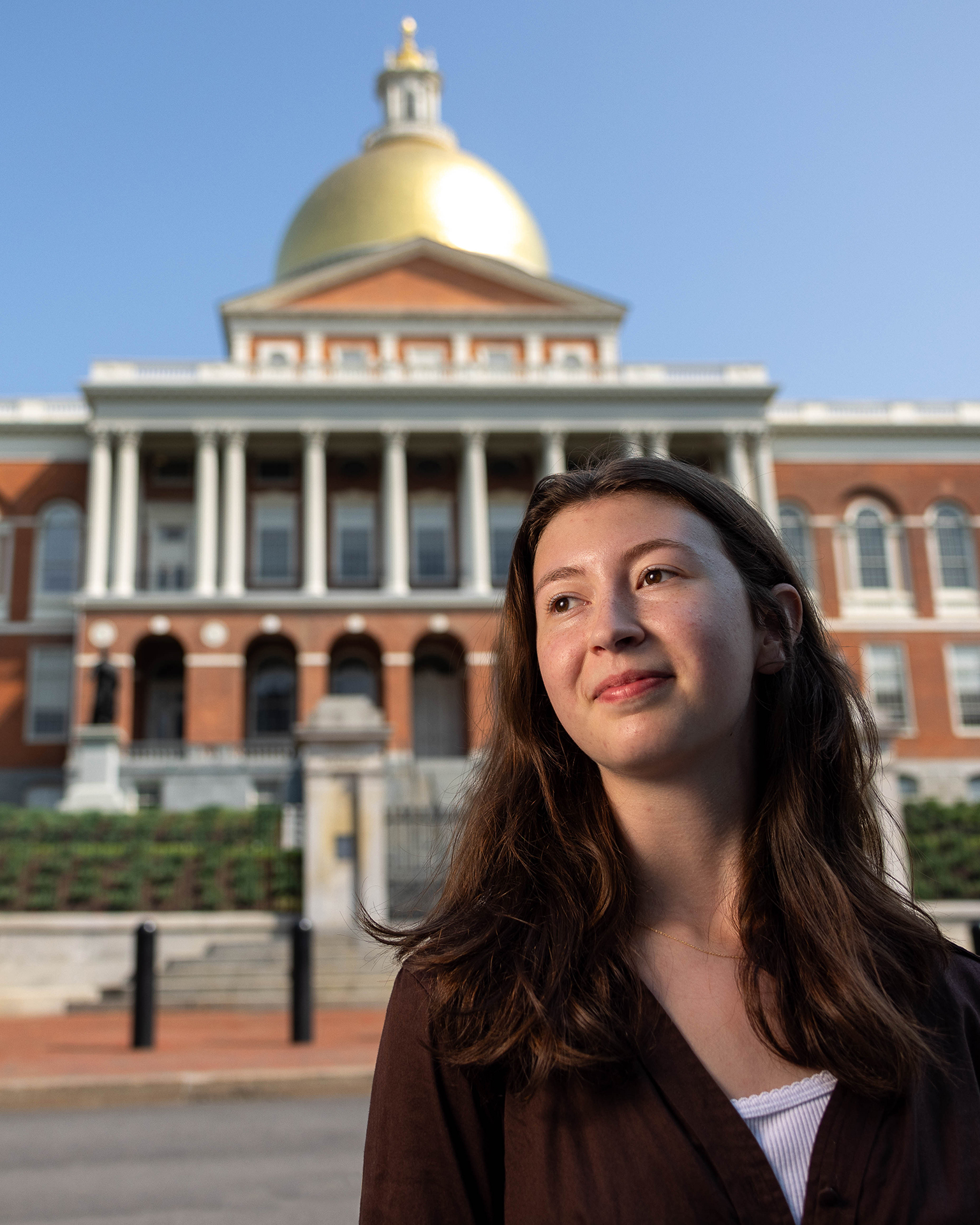 Aviva Gornick, ’25, poses for a portrait outside of the Massachusetts State House, where she is interning as part of the WOW fellowship program, on July 26, 2023. Photo/Gaelen Morse