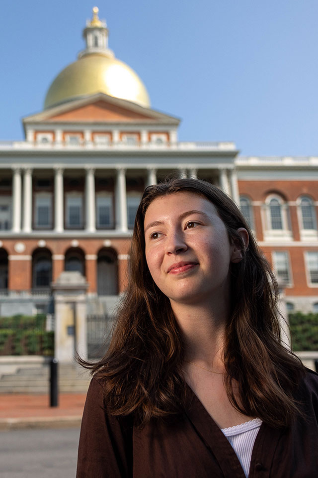 Aviva Gornick, ’25, poses for a portrait outside of the Massachusetts State House, where she is interning as part of the WOW fellowship program, on July 26, 2023. Photo/Gaelen Morse