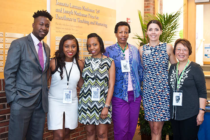 Six alumni panelists and a Hiatt staff member pose together after the 2017 Alumni of Color panel.