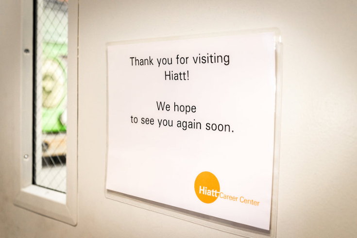 Hiatt career center exit sign "please come again"