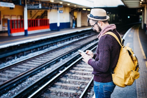 person waiting for a train to arrive