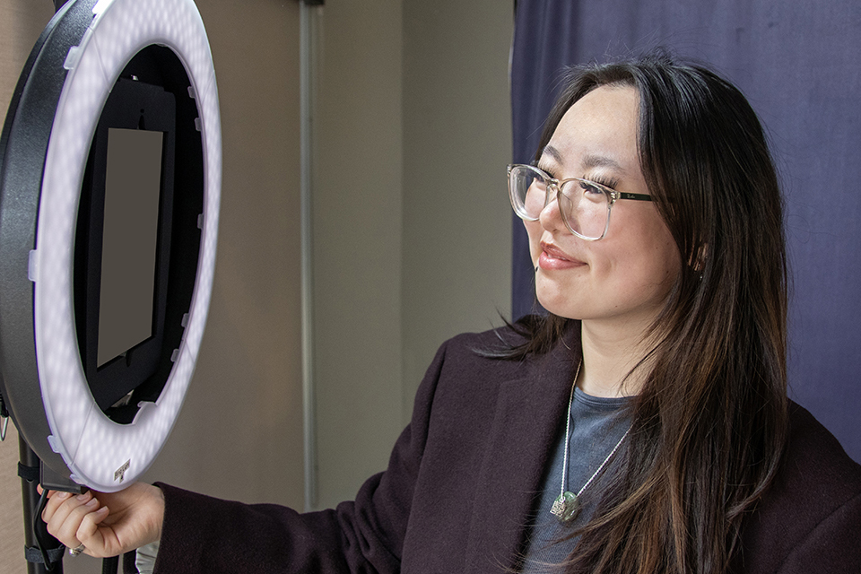 student uses the linkedin photo booth