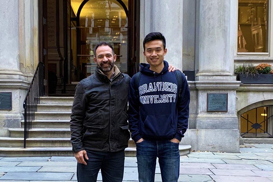 Tianmin Zhang and James Orsillo standing outside a building