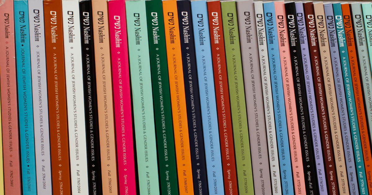 Journals on a bookshelf