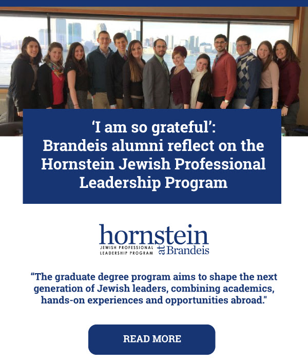 Group picture of Hornstein students in a conference room with the NYC skyline behind them. Linked to an article about alumni in The Forward.