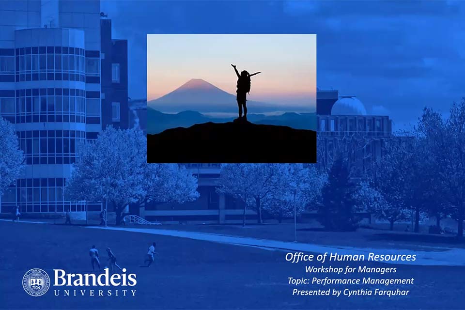 Title slide of presentation, Brandeis campus in the background with a blue overlay