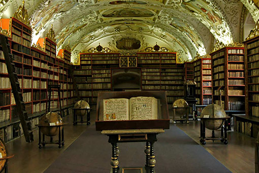 Interior of a large, old library with many books