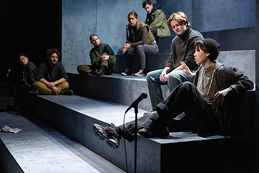 Students on stage during a performance