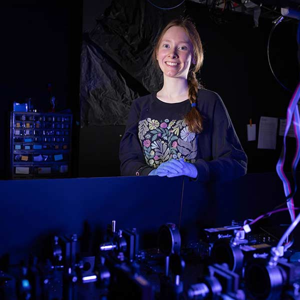 Fiona Stewart working in a dark lab