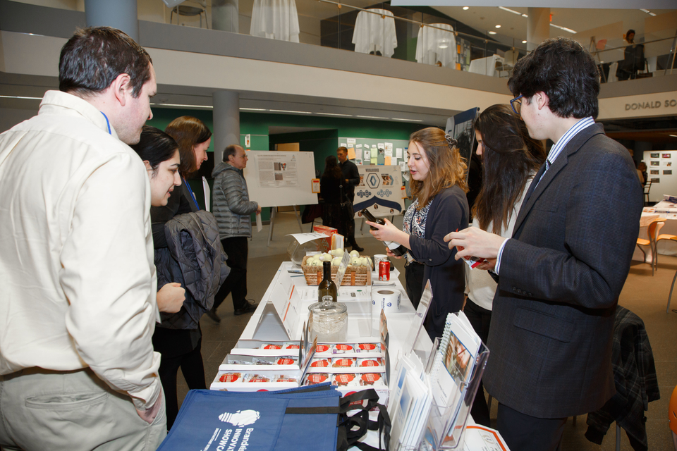 people gathering around a table