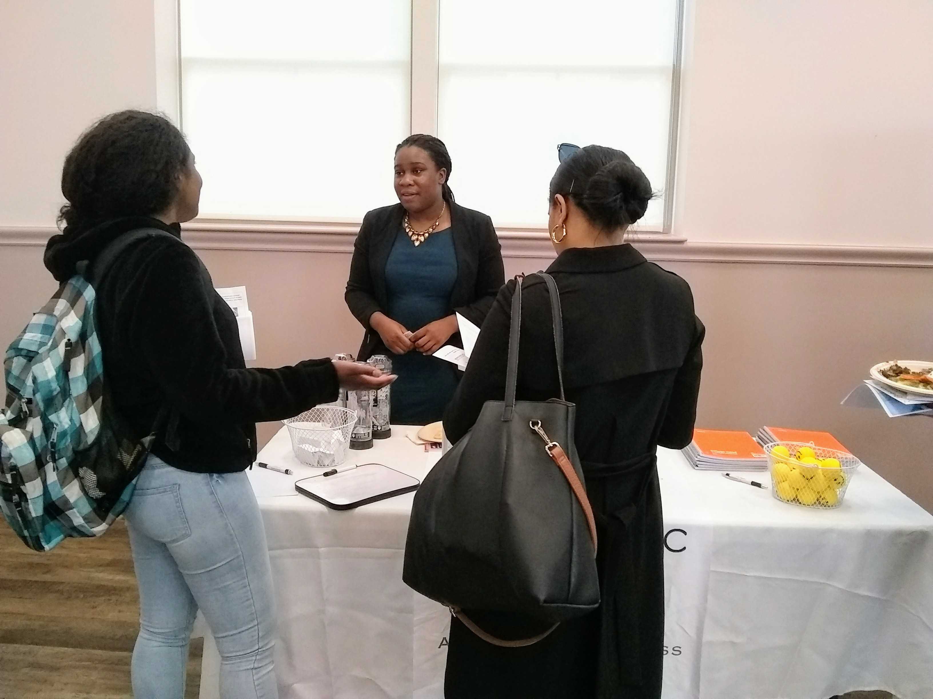 Jessica Sanon speaks to attendees at Mass Innovation Nights