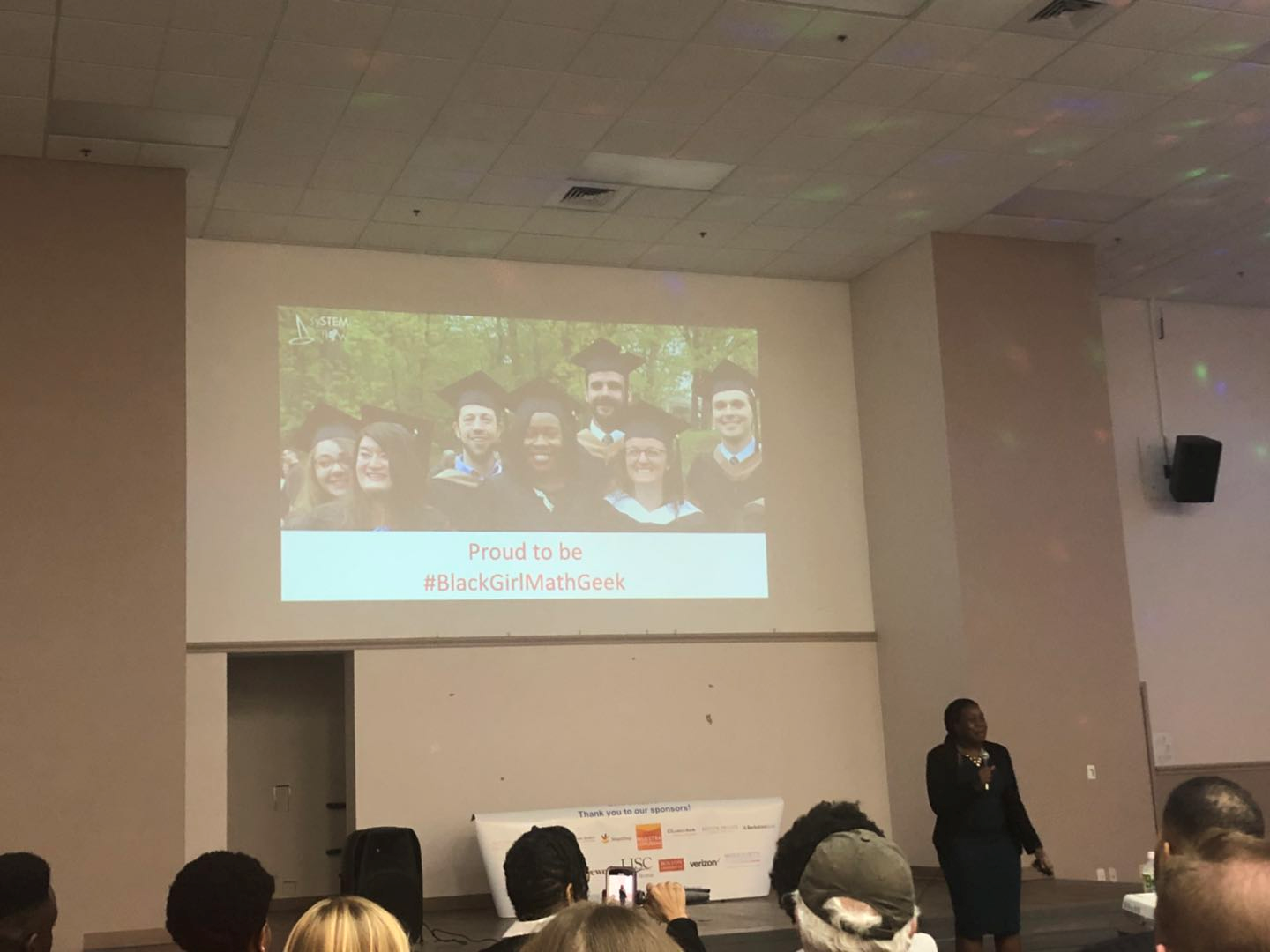 Jessica Sanon pitches her startup, sySTEMic Flow, at Mass Innovation Nights