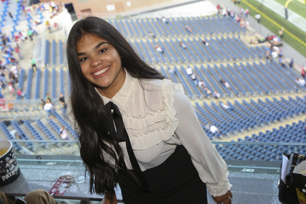 Jennifer Almodovar Jimenez standing in front of the field at Gillette Stadium