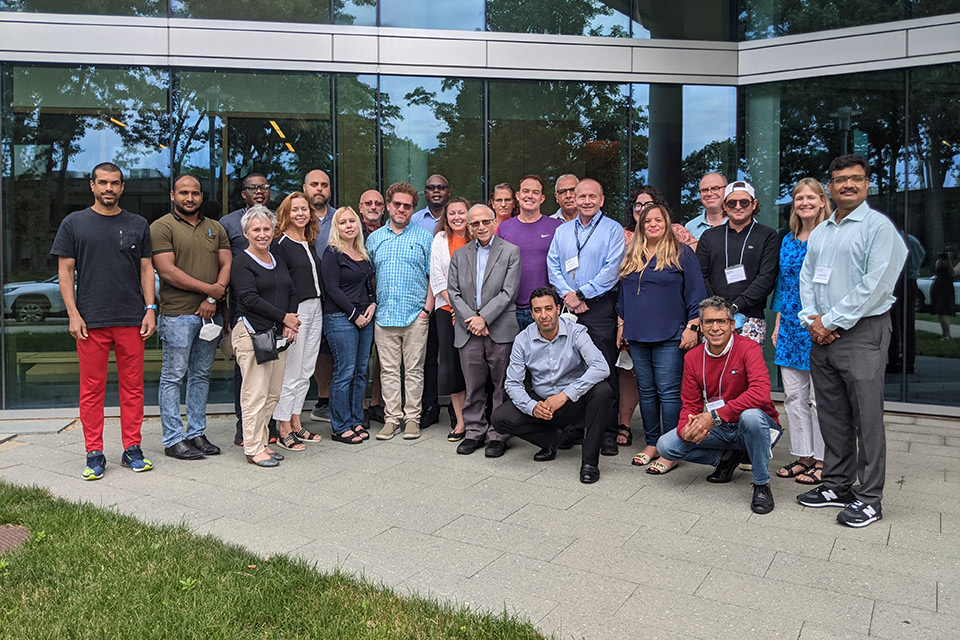 Group of people posing together outdoors