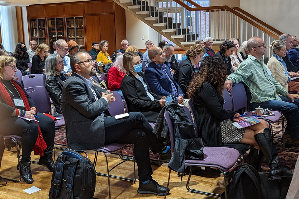 An audience of seated people