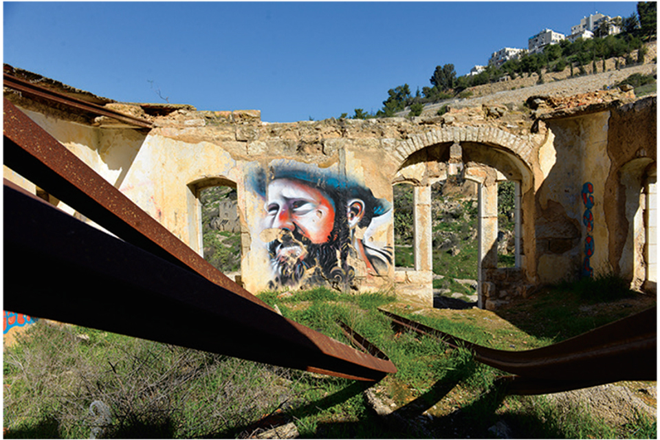 Art spray-painted on building ruins