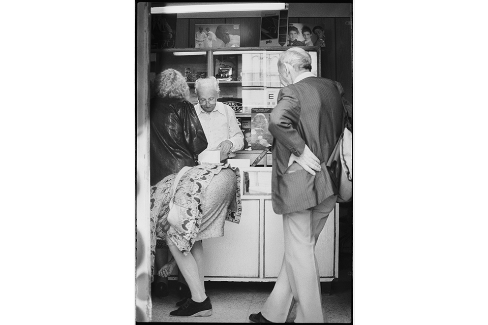 People at a shop counter