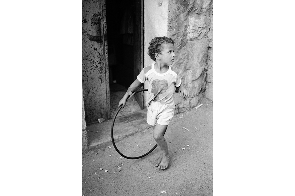 Child with a hoop