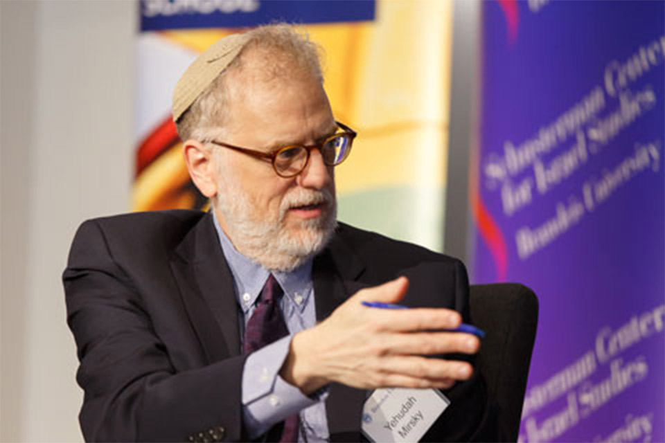 Bearded man speaking and gesturing