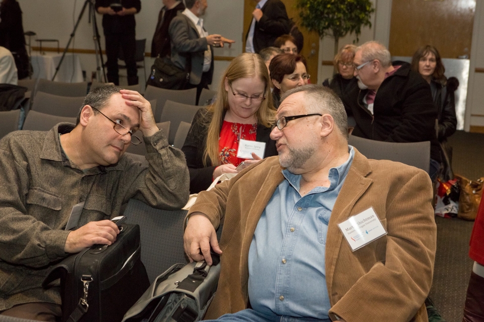 Two fellows in deep discussion