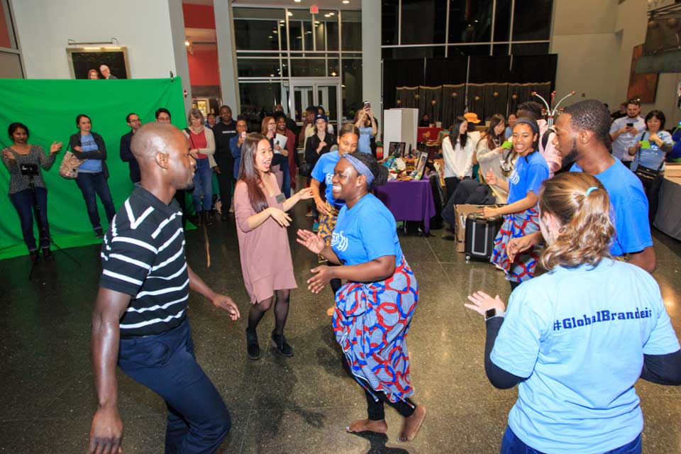 People dance during I Am Global Week