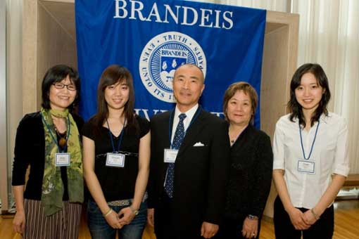Tom Watanabe '73 and his wife, Hidemi, with students at the Wien 50th anniversary celebration in 2008.