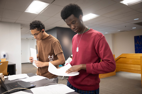 Students with papers