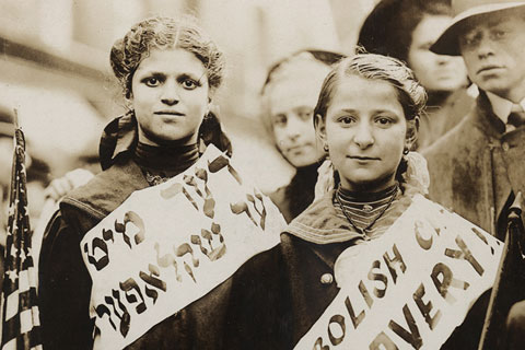 Two children protesting against child slavery
