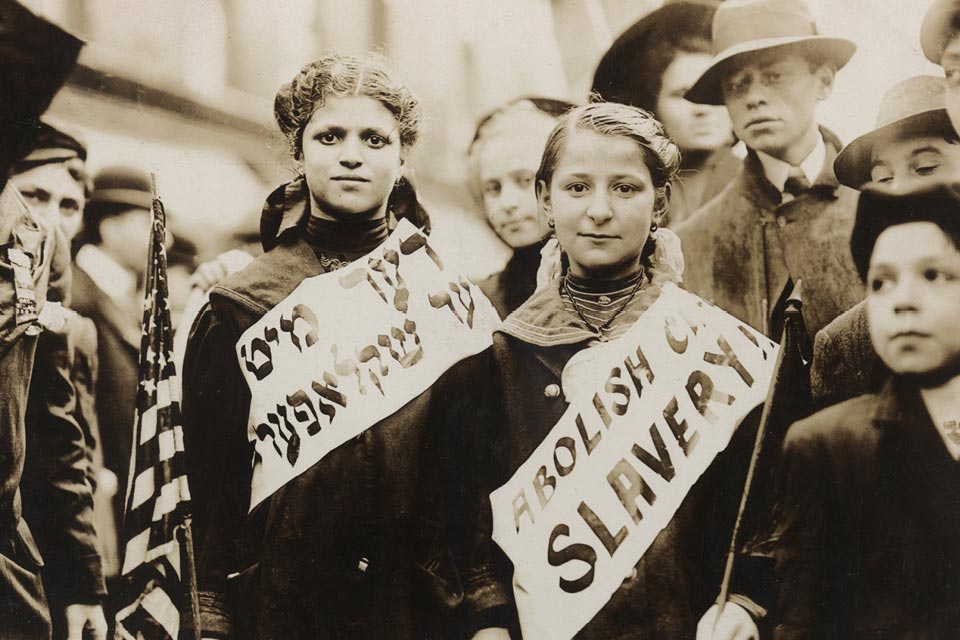 Two children protesting against child slavery