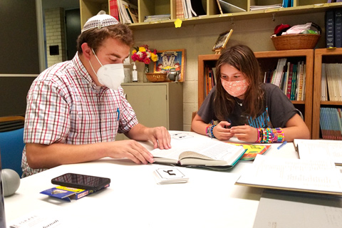 Rabbi Rosen teaching a student at his temple in Jackson, Mississippi.