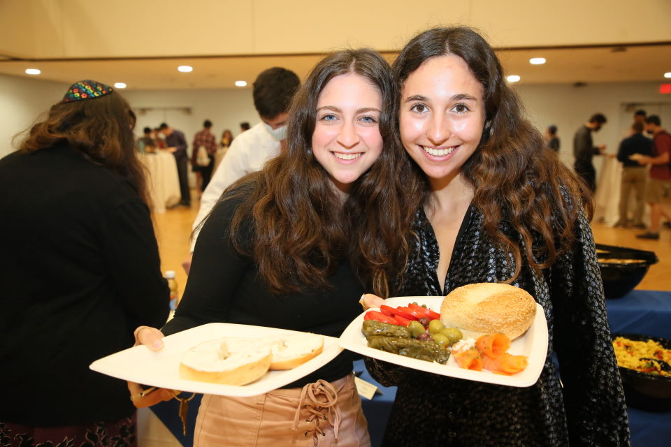 Two students with their food