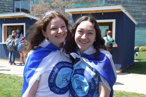 Students draped in Israel flag