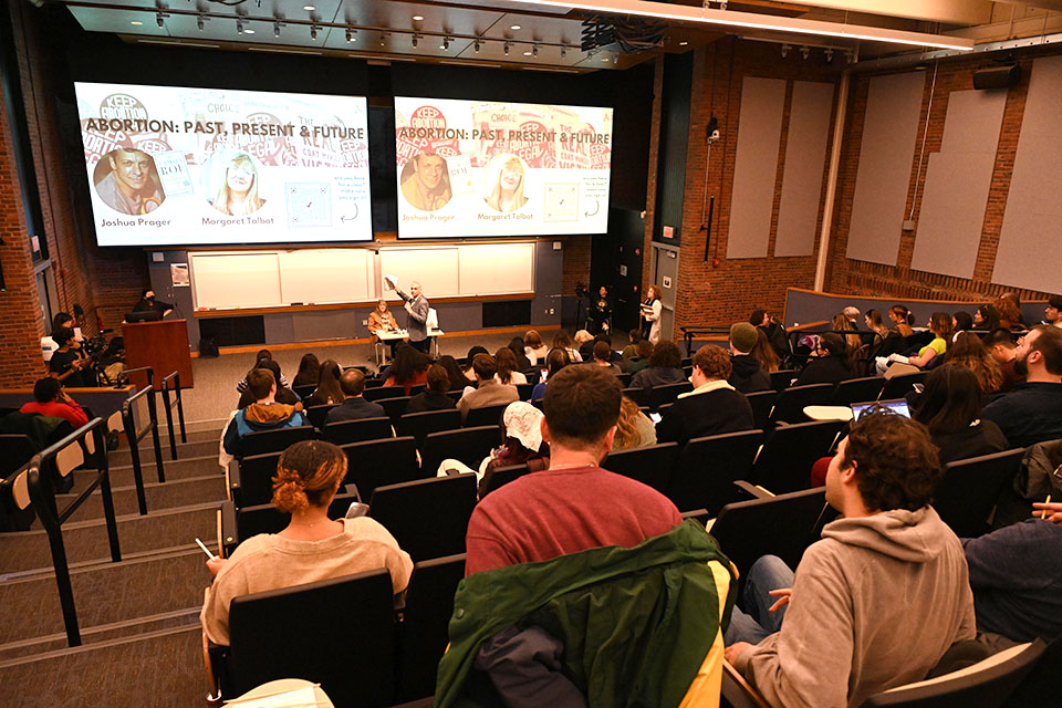 A crowd of students waits for the abortion forum to start. 