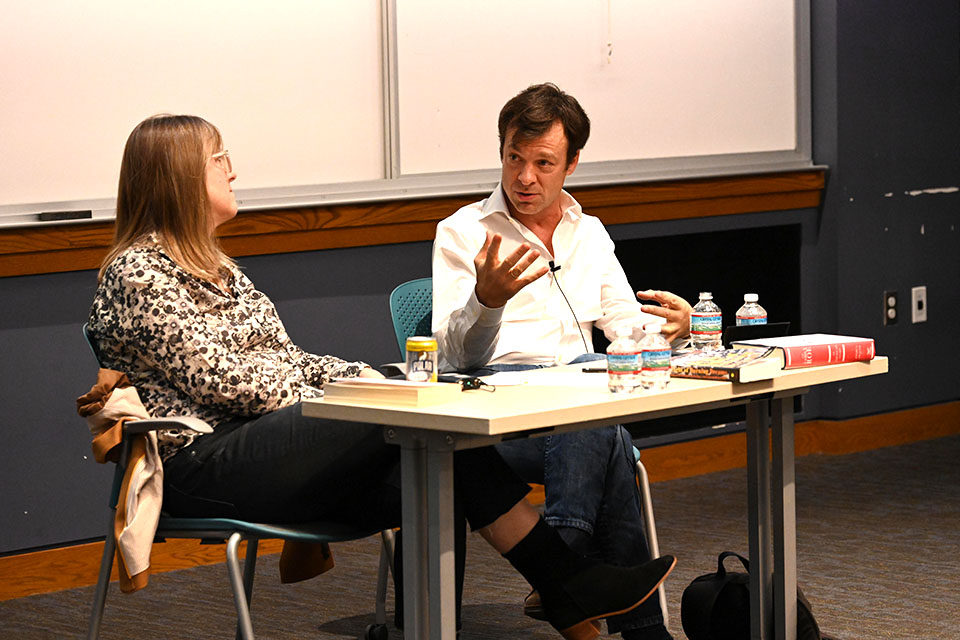 Margaret Talbot and Joshua Prager sit at a table.